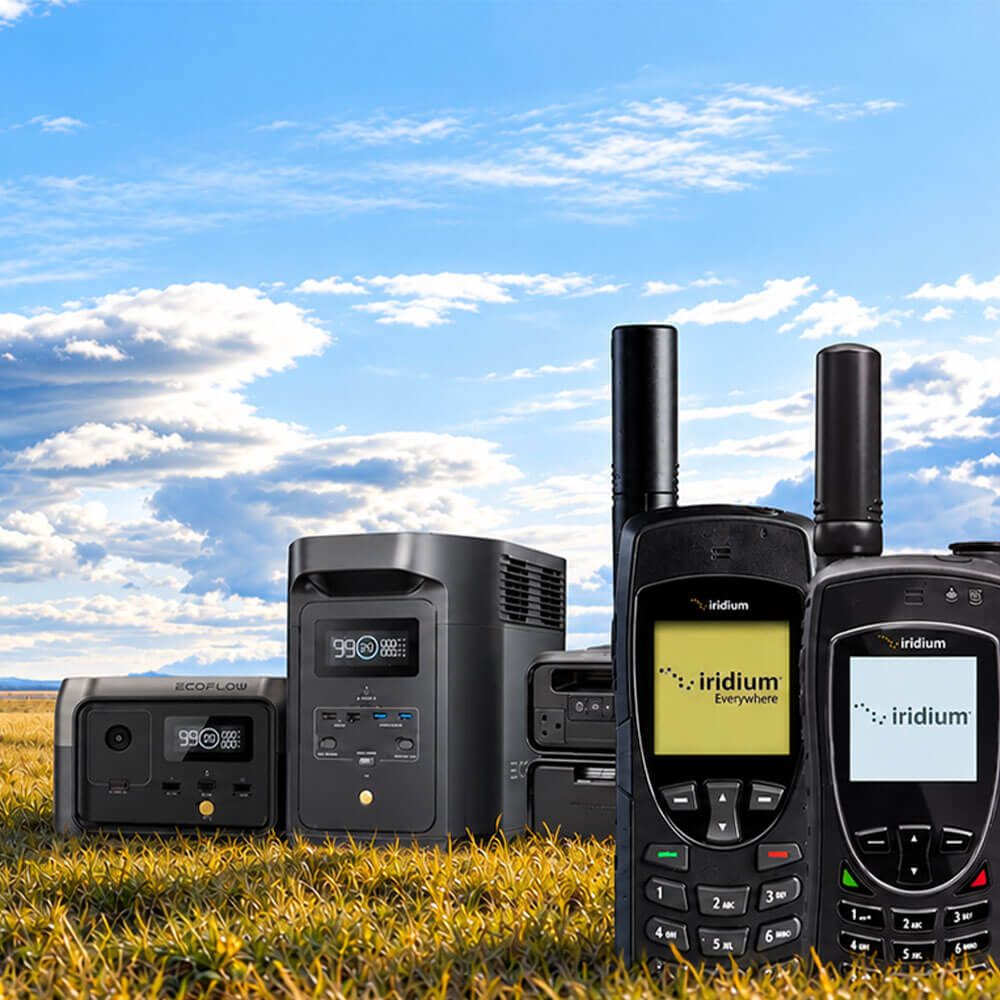 Iridium 9555 and Iridium 9575 satellite phones with power stations in a remote area