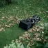 EcoFlow BLADE Robotic Lawn Mower Cleaning Leaves