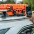 Starlink Mini Star-Batt on top of a car with high internet speeds measurement