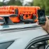 Starlink Mini Star-Batt on top of a car with high internet speeds measurement